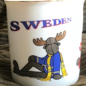 Allan Fink Sweden Moose Mug with Blue and Yellow Scarf